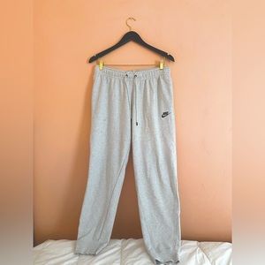 Women’s Nike “Fleece Joggers” in light grey, size large.